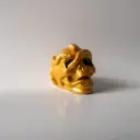 Гіпсова фігура Череп зі зміями жовтий